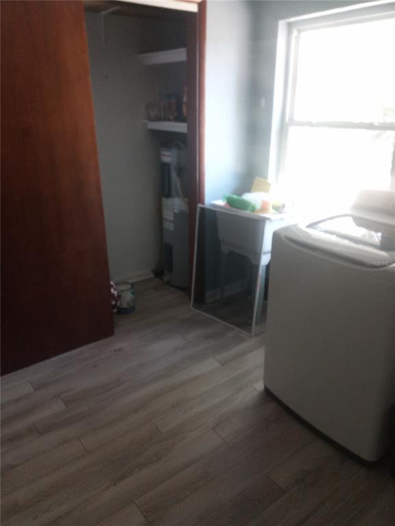 2822 South Dean Road Orlando, FL 32825 - Photo 15 of 43 a room with a window and washer