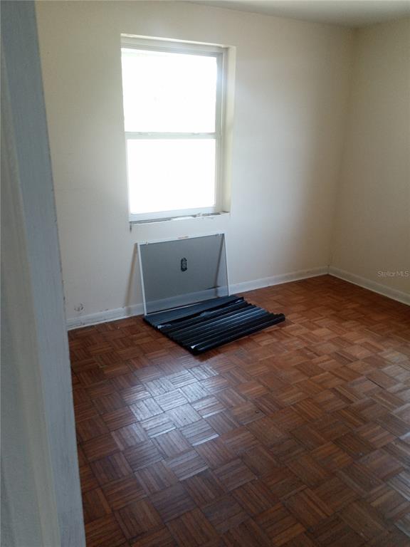 2822 South Dean Road Orlando, FL 32825 - Photo 16 of 43 an empty room with a window