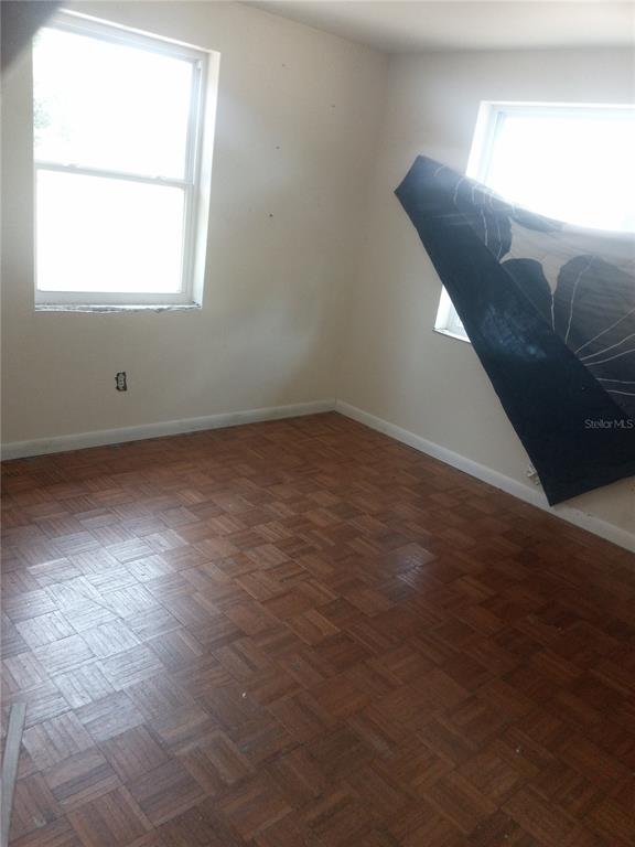 2822 South Dean Road Orlando, FL 32825 - Photo 18 of 43 an empty room with a window