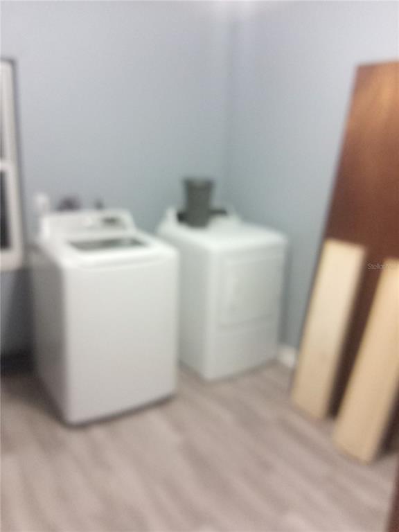 2822 South Dean Road Orlando, FL 32825 - Photo 30 of 43 a utility room with dryer and washer