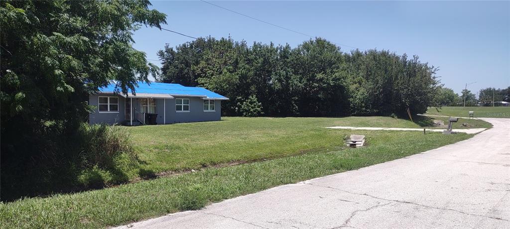 2822 South Dean Road Orlando, FL 32825 - Photo 3 of 43 a view of a house with a yard