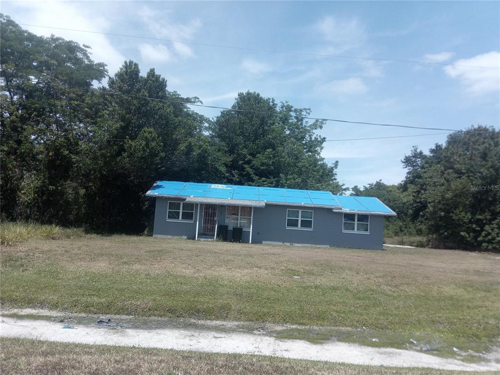 2822 South Dean Road Orlando, FL 32825 - Photo 43 of 43 a view of house with a yard
