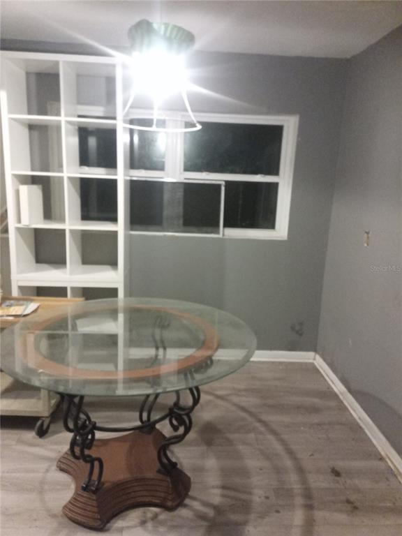 2822 South Dean Road Orlando, FL 32825 - Photo 6 of 43 a room with a workspace