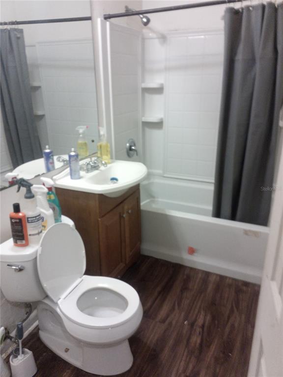 2822 South Dean Road Orlando, FL 32825 - Photo 7 of 43 a bathroom with a sink toilet and shower