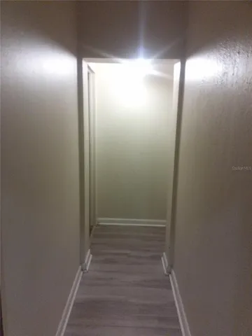 a view of hallway with shower