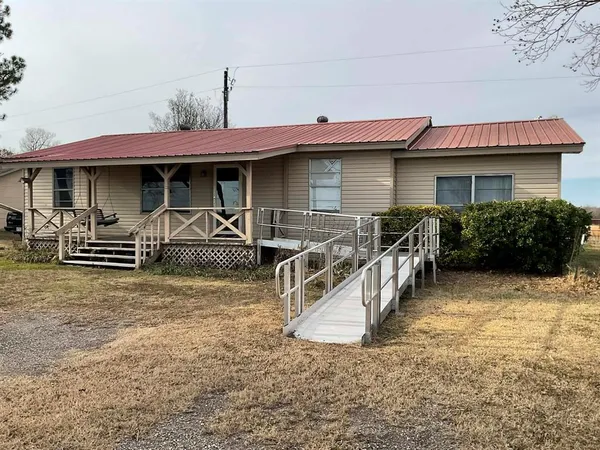 a view of a house with patio