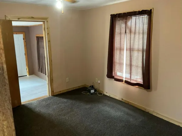 a bathroom with a shower curtain