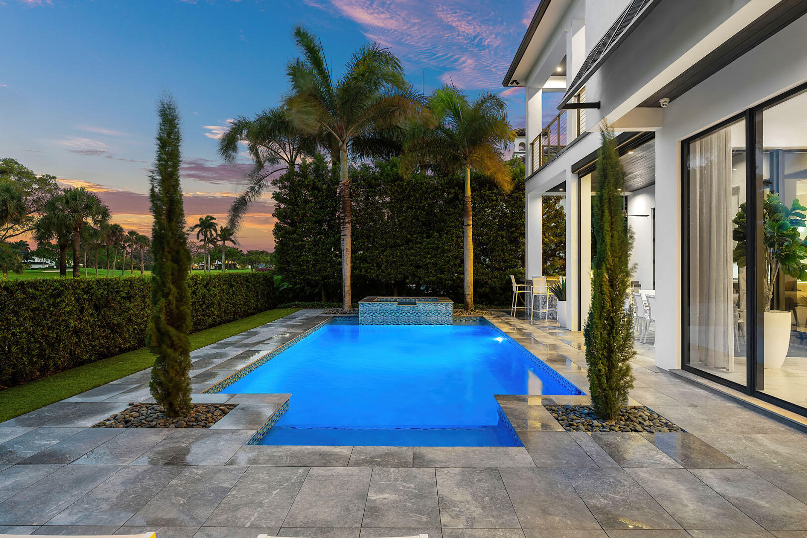 1576 Thatch Palm Drive Boca Raton, FL 33432 - Photo 61 of 74 1576_Thatch_Palm_Drive_Dusk_20