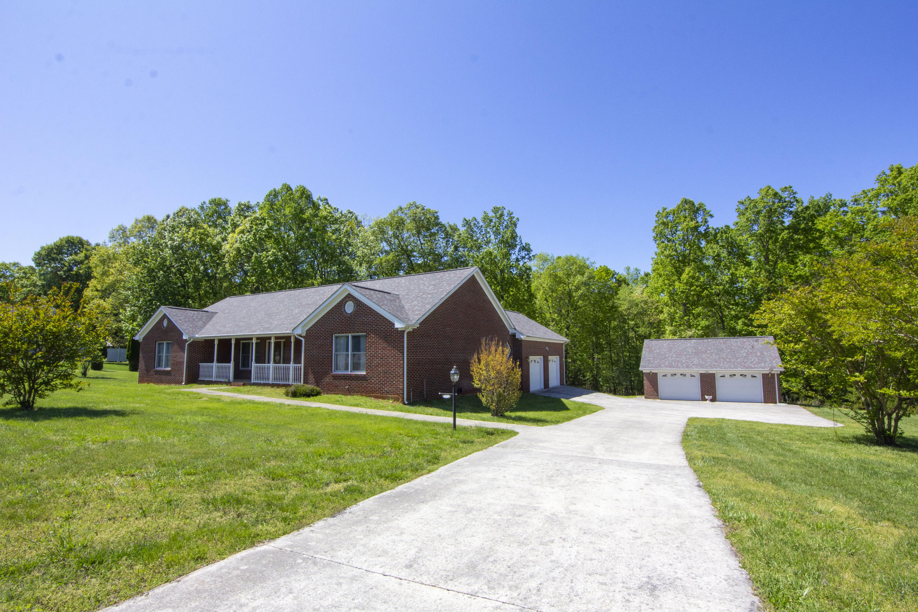 525 Mallard Point Road Wirtz, VA 24184 - Photo 1 of 38 a view of a house with a yard and green space