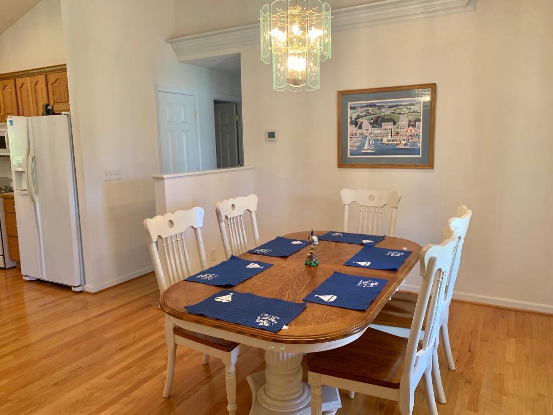 525 Mallard Point Road Wirtz, VA 24184 - Photo 14 of 38 a view of a dining room with furniture and wooden floor