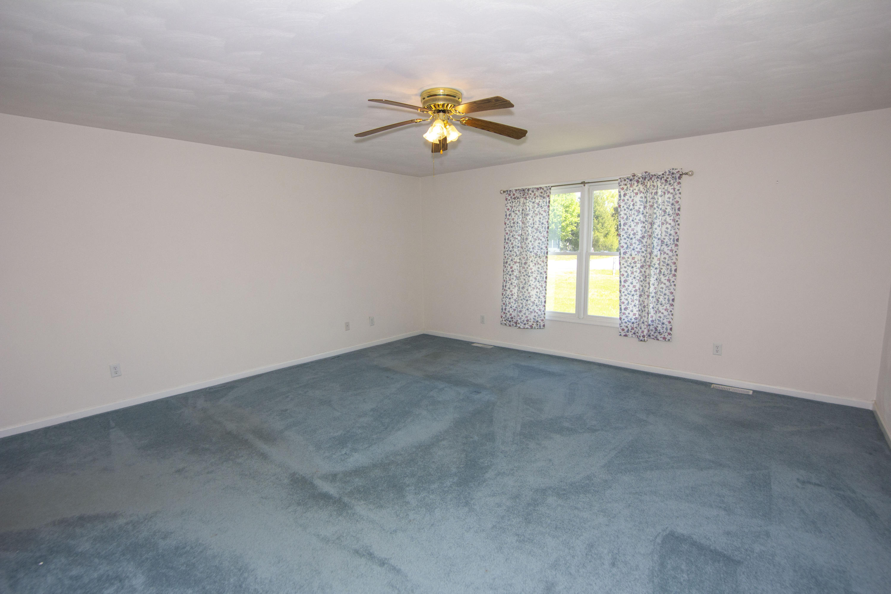 525 Mallard Point Road Wirtz, VA 24184 - Photo 15 of 38 a view of an empty room with a window