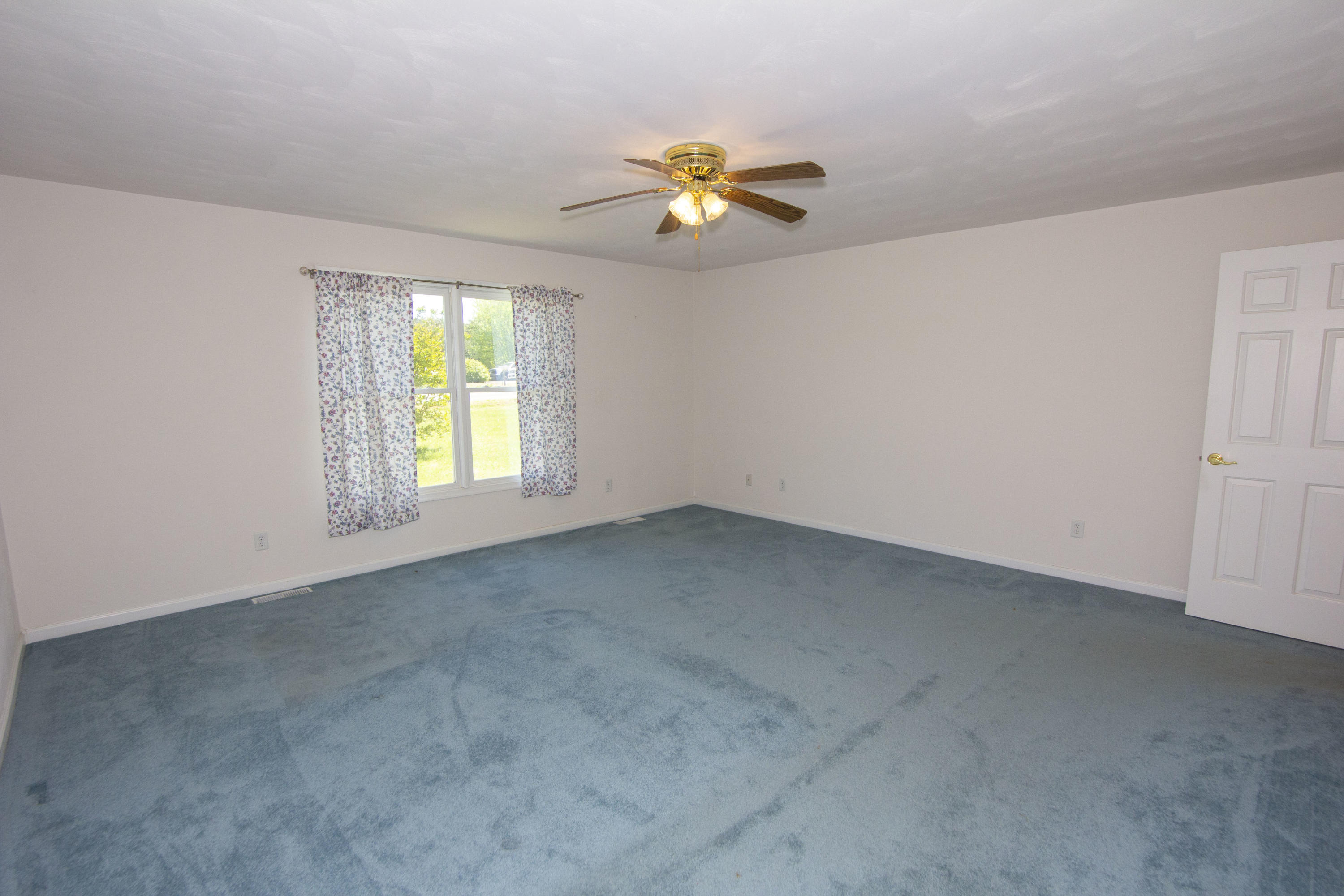 525 Mallard Point Road Wirtz, VA 24184 - Photo 18 of 38 a view of an empty room with a window