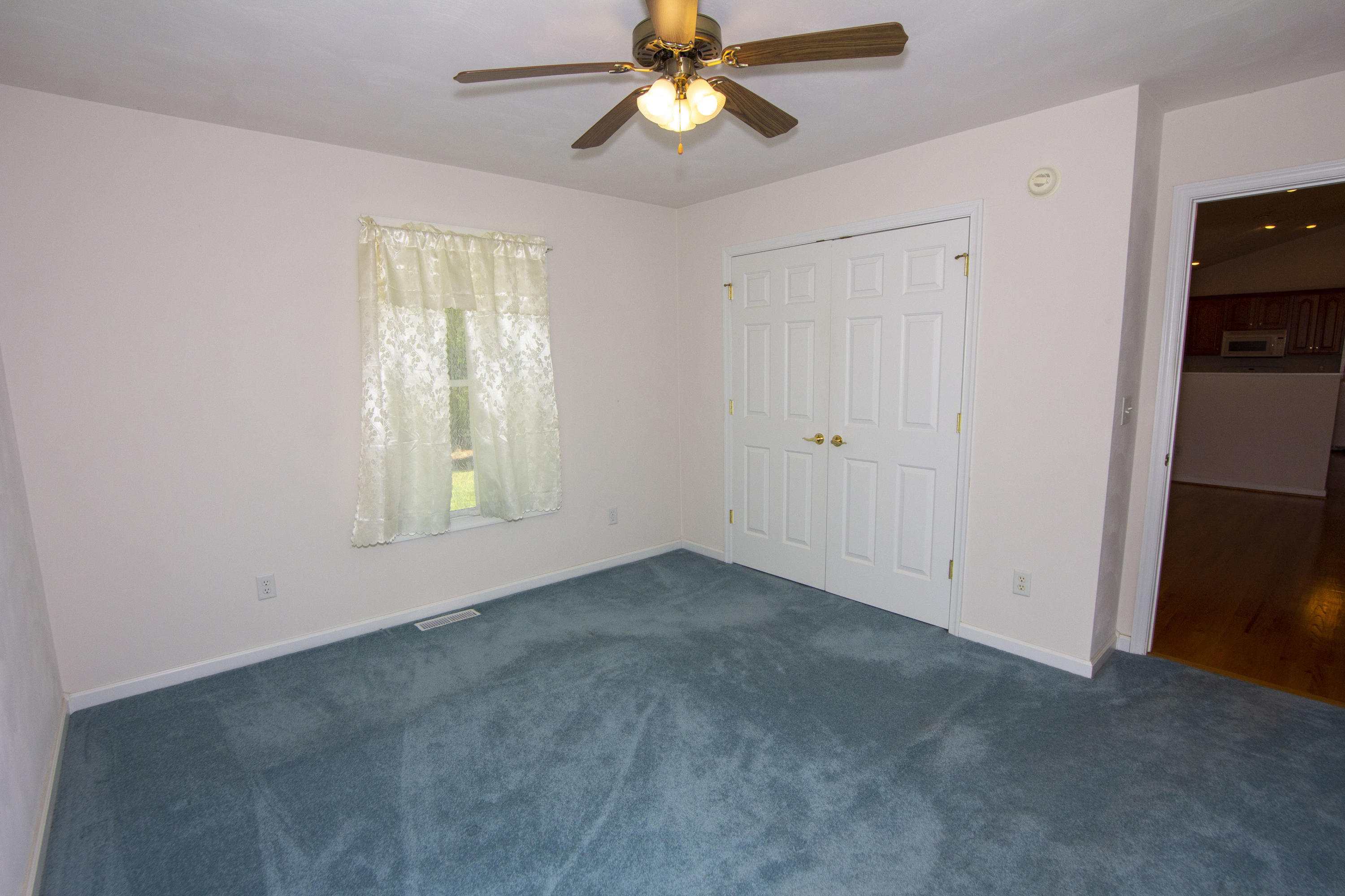 525 Mallard Point Road Wirtz, VA 24184 - Photo 22 of 38 an empty room with windows and fan