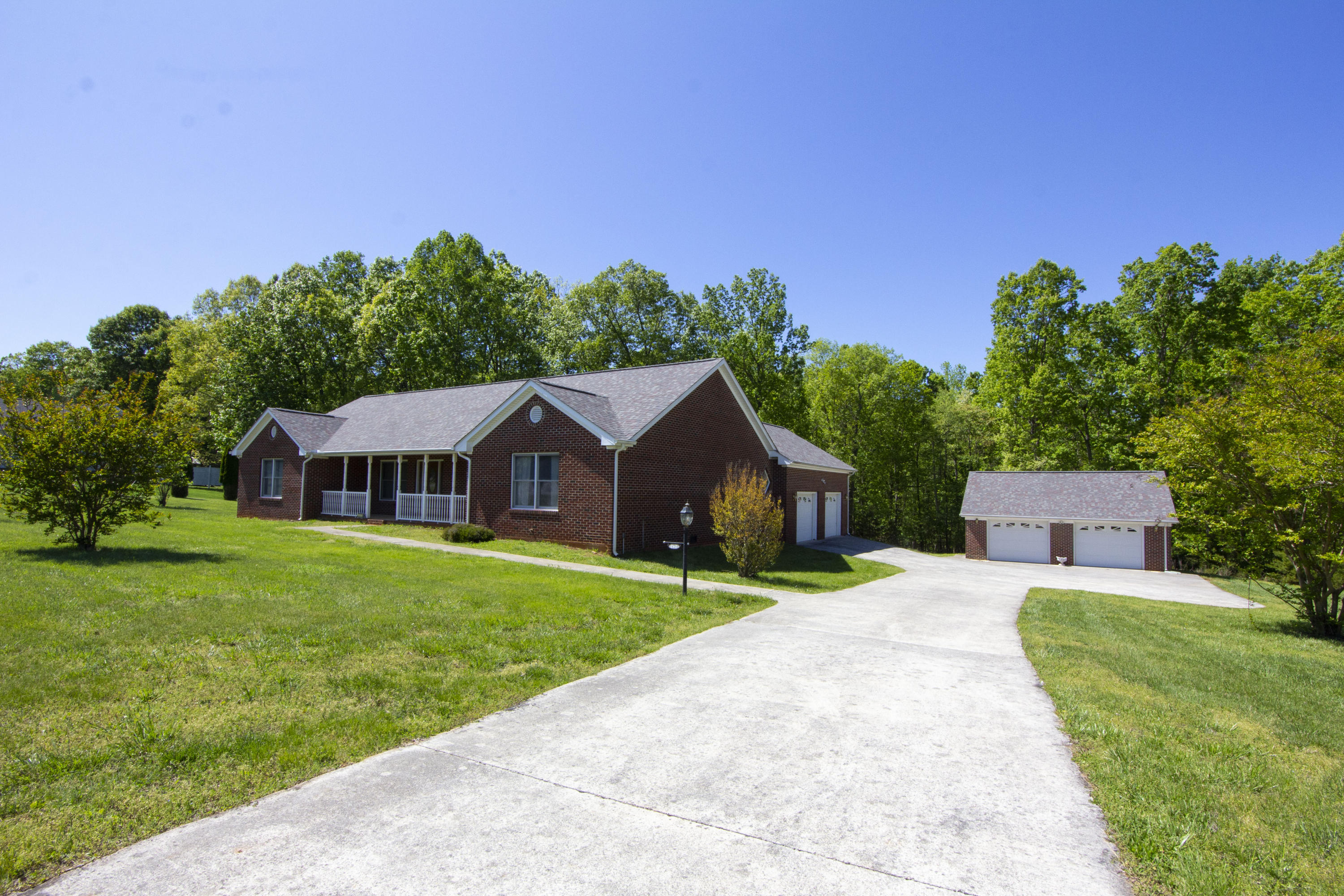 525 Mallard Point Road Wirtz, VA 24184 - Photo 32 of 38 a front view of a house with garden