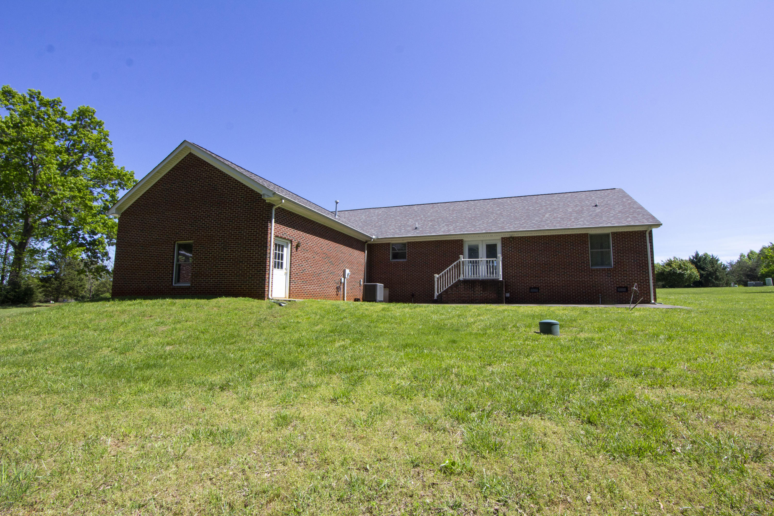 525 Mallard Point Road Wirtz, VA 24184 - Photo 36 of 38 a house view with a garden space