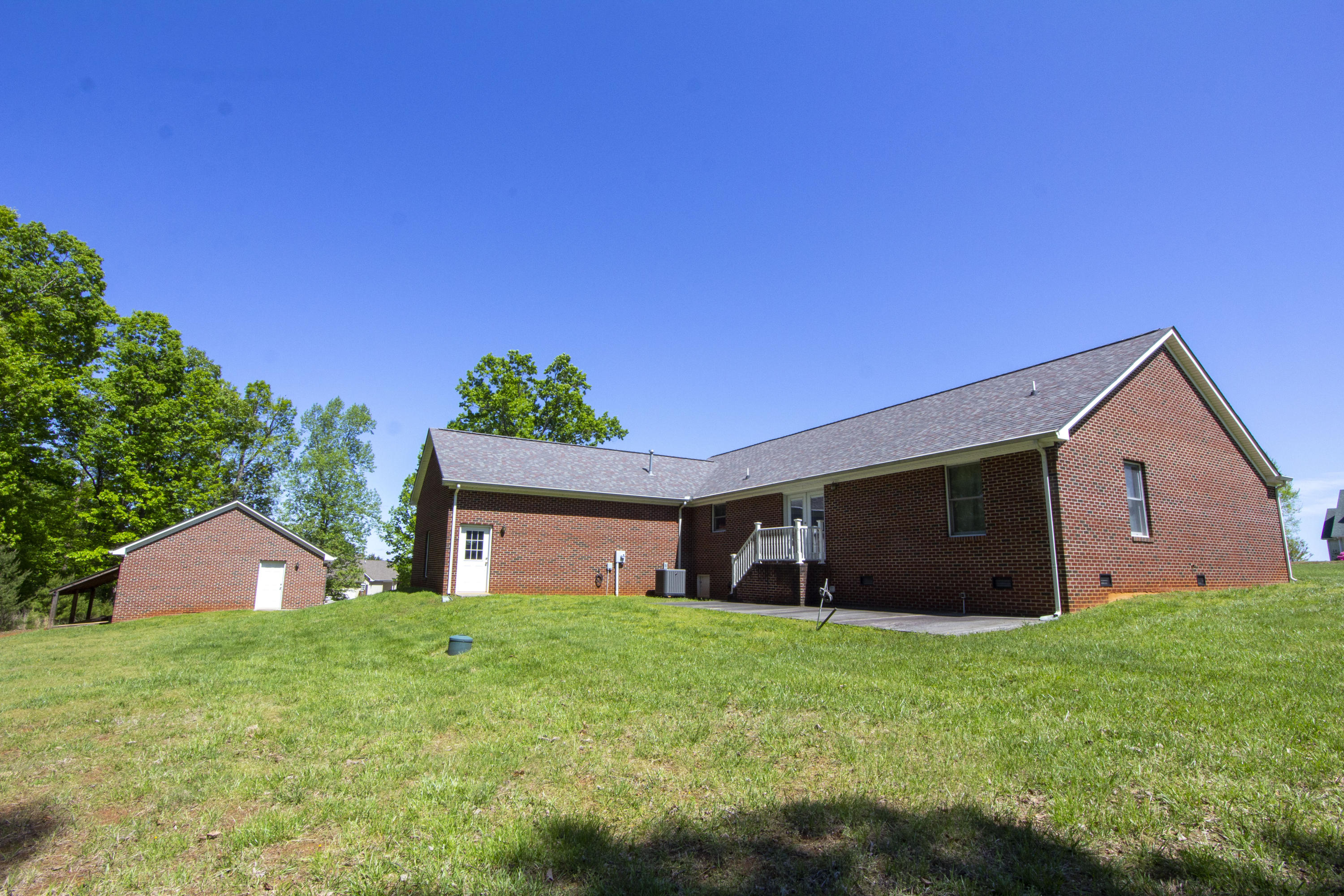 525 Mallard Point Road Wirtz, VA 24184 - Photo 37 of 38 a front view of house with a garden
