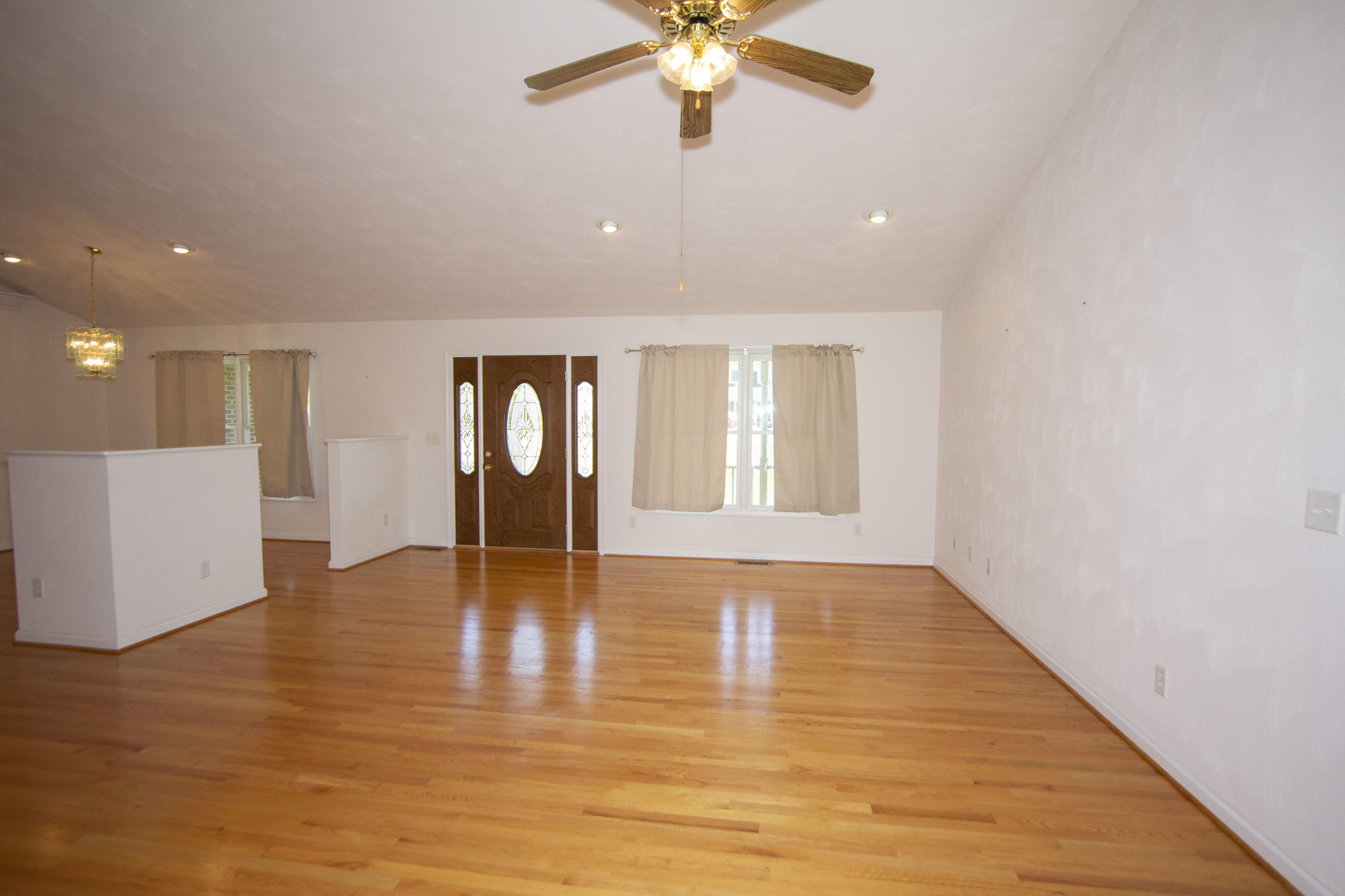 525 Mallard Point Road Wirtz, VA 24184 - Photo 9 of 38 a view of an empty room with window and wooden floor