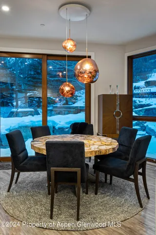 a view of a dining room with furniture