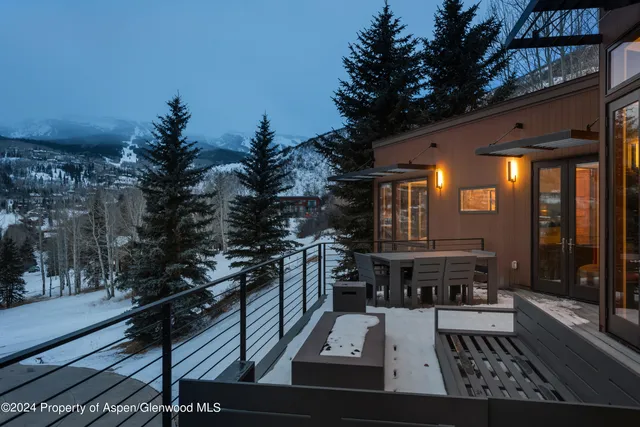 a view of a house with a tree