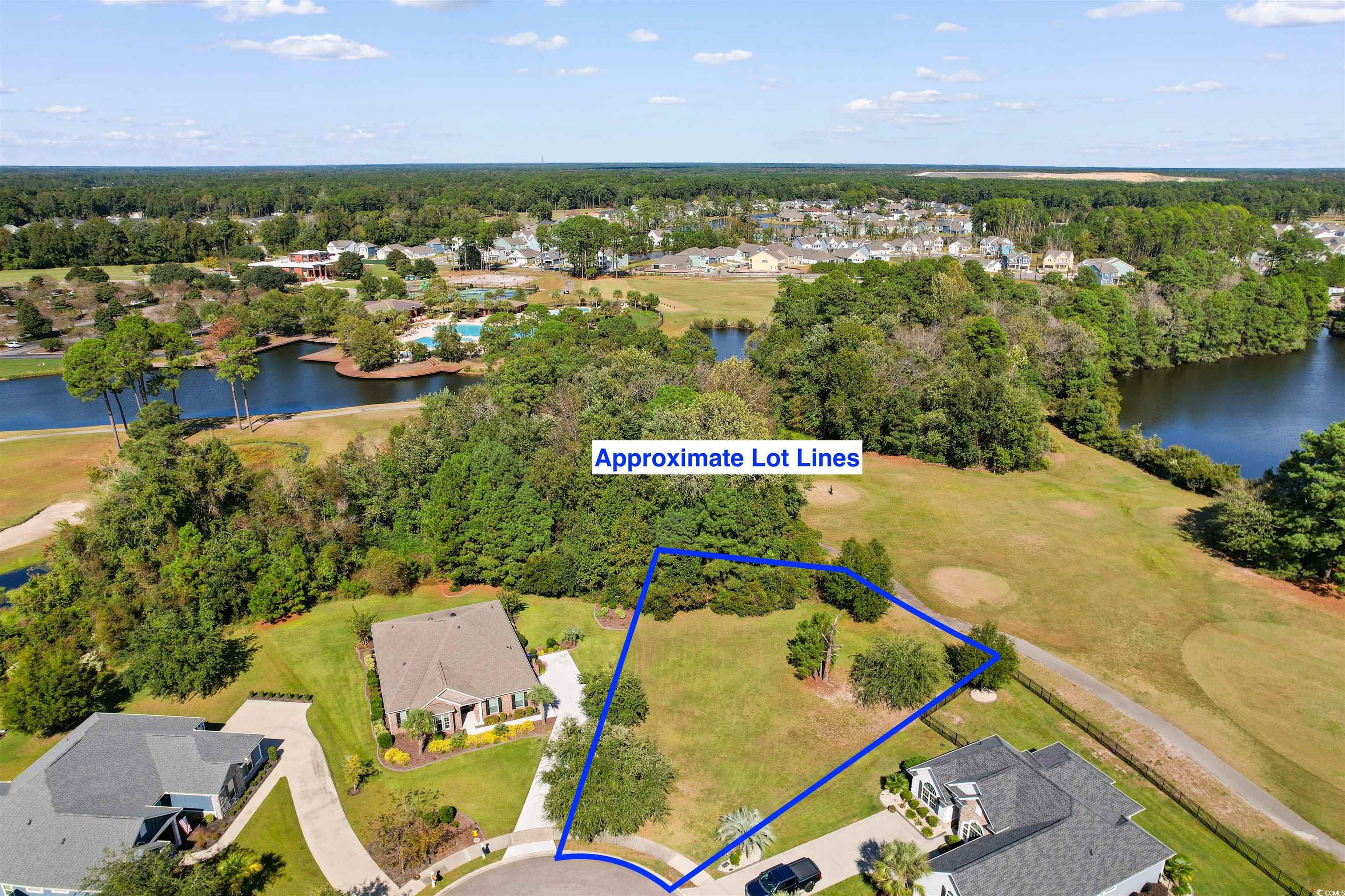 1005 Whooping Crane Drive Conway, SC 29526 - Photo 13 of 35 Aerial view of residential area with a large body of water and property boundaries highlighted