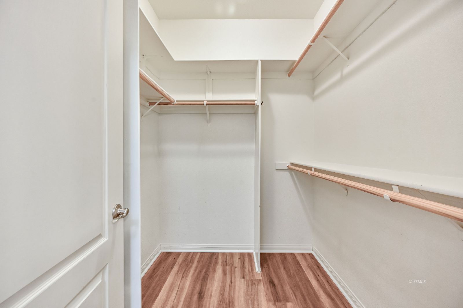 425 Acacia Street Ridgecrest, CA 93555 - Photo 39 of 49 a view of walk in closet with empty racks