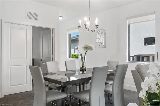 a view of a dining room with furniture