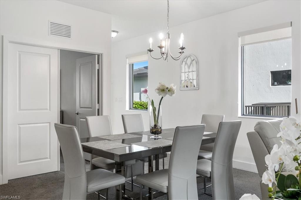 4925 Gambero Way Avenue Immokalee, FL 34142 - Photo 14 of 50 a view of a dining room with furniture