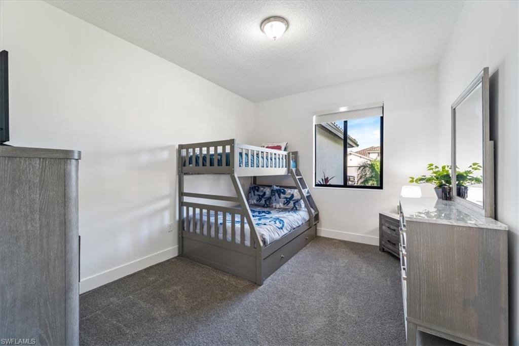 4925 Gambero Way Avenue Immokalee, FL 34142 - Photo 25 of 50 a living room with furniture and a window