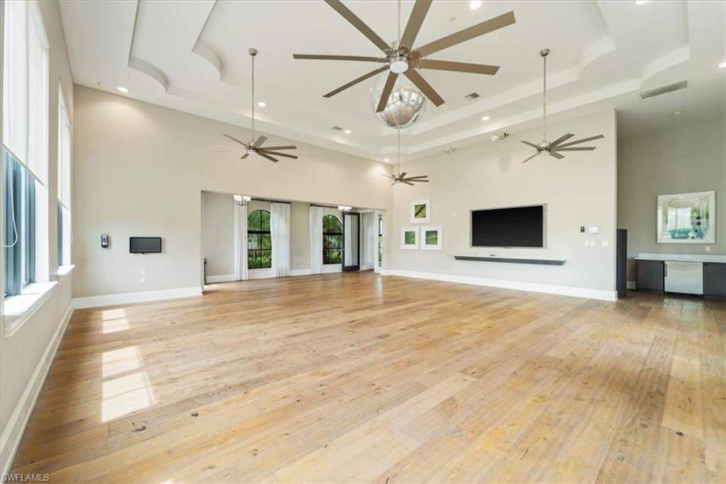 4925 Gambero Way Avenue Immokalee, FL 34142 - Photo 44 of 50 a view of an empty room with a kitchen and a window