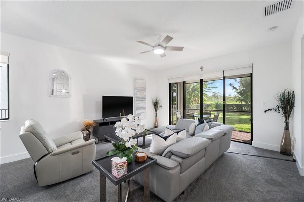 4925 Gambero Way Avenue Immokalee, FL 34142 - Photo 8 of 50 a living room with furniture and a flat screen tv