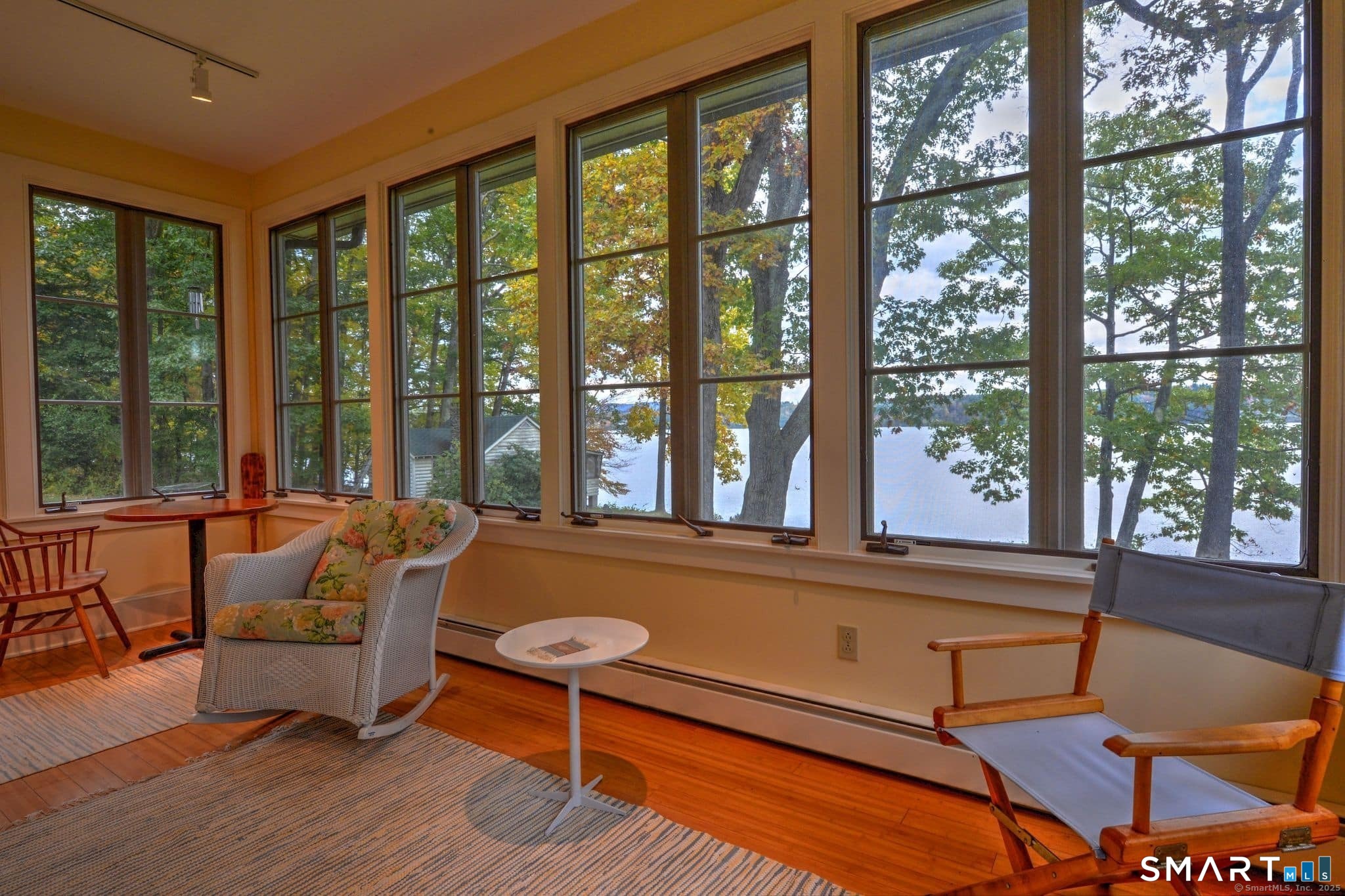 63 Old Cne Road Salisbury, CT 06039 - Photo 22 of 39 a living room with furniture and a large window