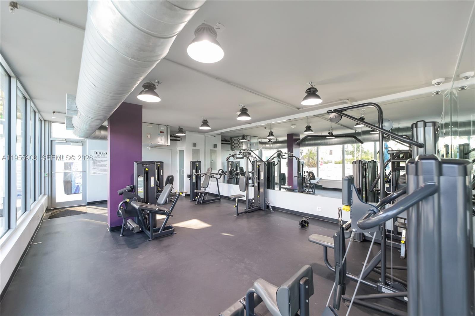 100 Lincoln Road, Unit 903 Miami Beach, FL 33139 - Photo 16 of 17 a view of a room with gym equipment
