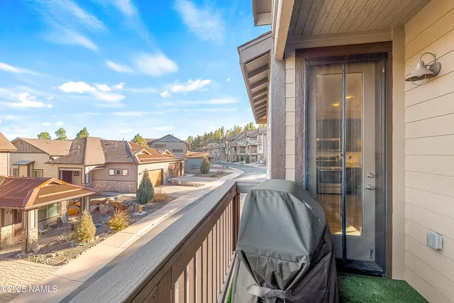 a view of a balcony with city view