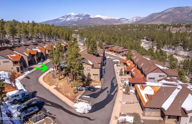 a view of a city with mountains