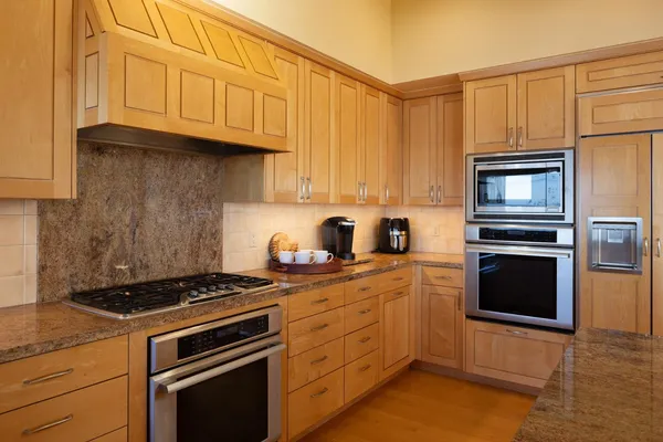 a kitchen with a sink and a window
