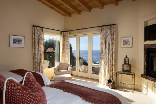 a bathroom with a sink a toilet and a shower