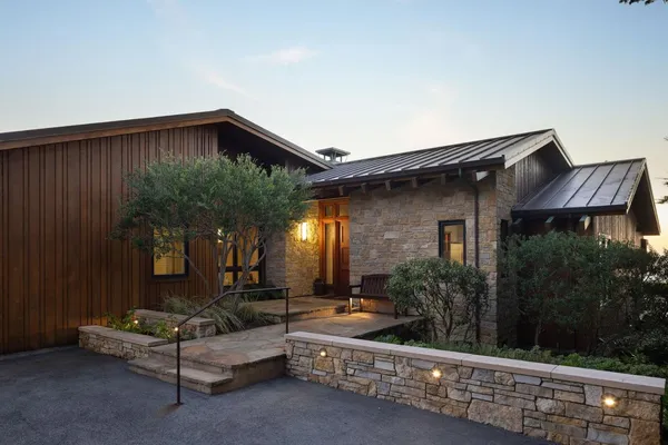 a view of a patio with table and chairs
