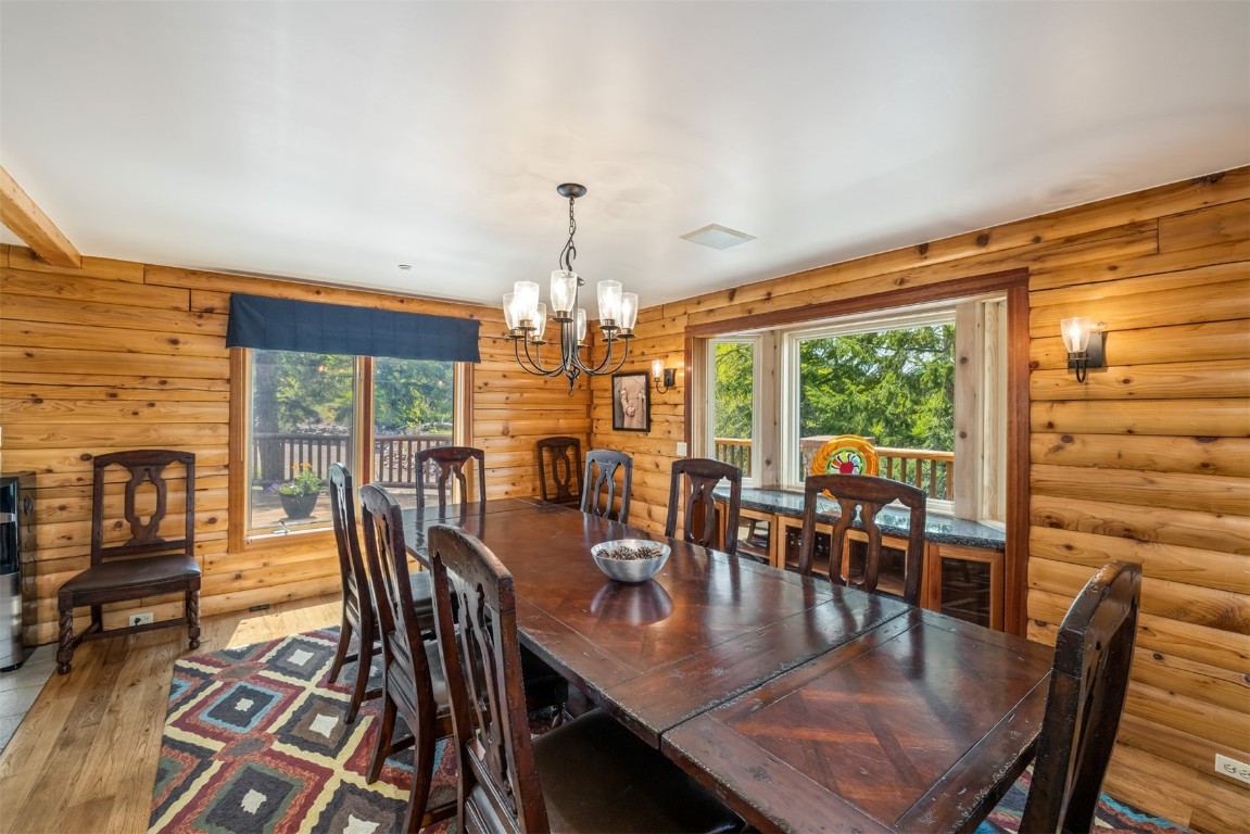2244 Johnson Road Silverthorne, CO 80498 - Photo 12 of 45 a view of a dining room with furniture window and outside view