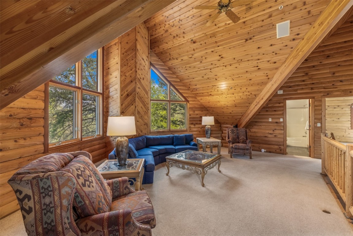 2244 Johnson Road Silverthorne, CO 80498 - Photo 24 of 45 a living room with furniture and a large window