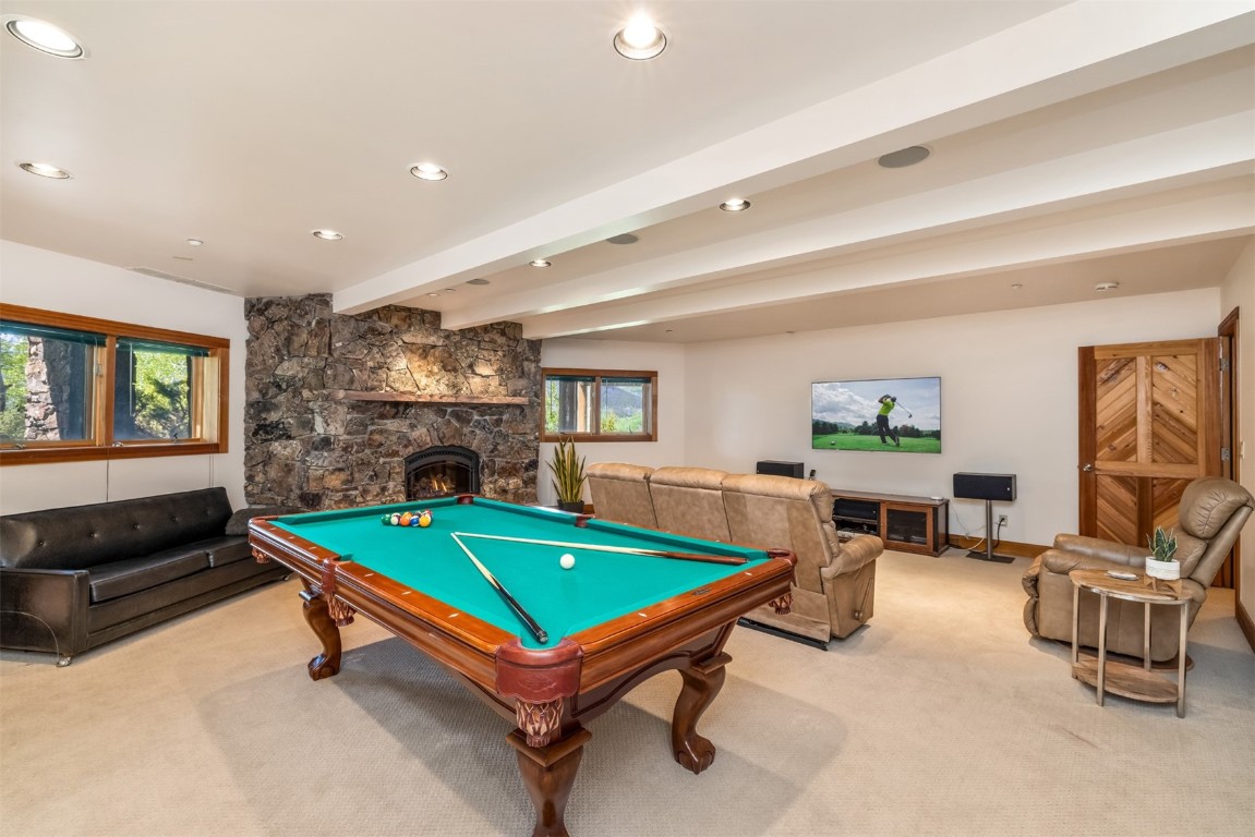 2244 Johnson Road Silverthorne, CO 80498 - Photo 30 of 45 a living room with pool table and furniture
