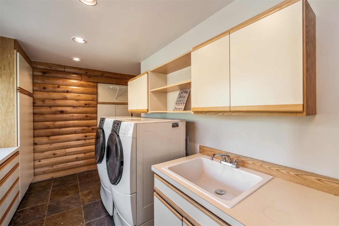 2244 Johnson Road Silverthorne, CO 80498 - Photo 36 of 45 a utility room with dryer and washer