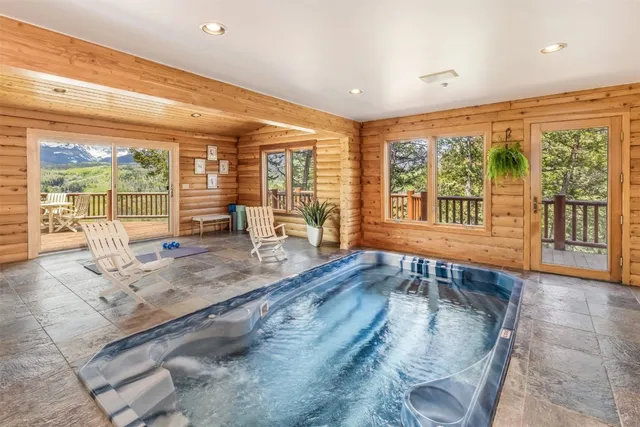 a kitchen with stainless steel appliances granite countertop a stove oven and a refrigerator