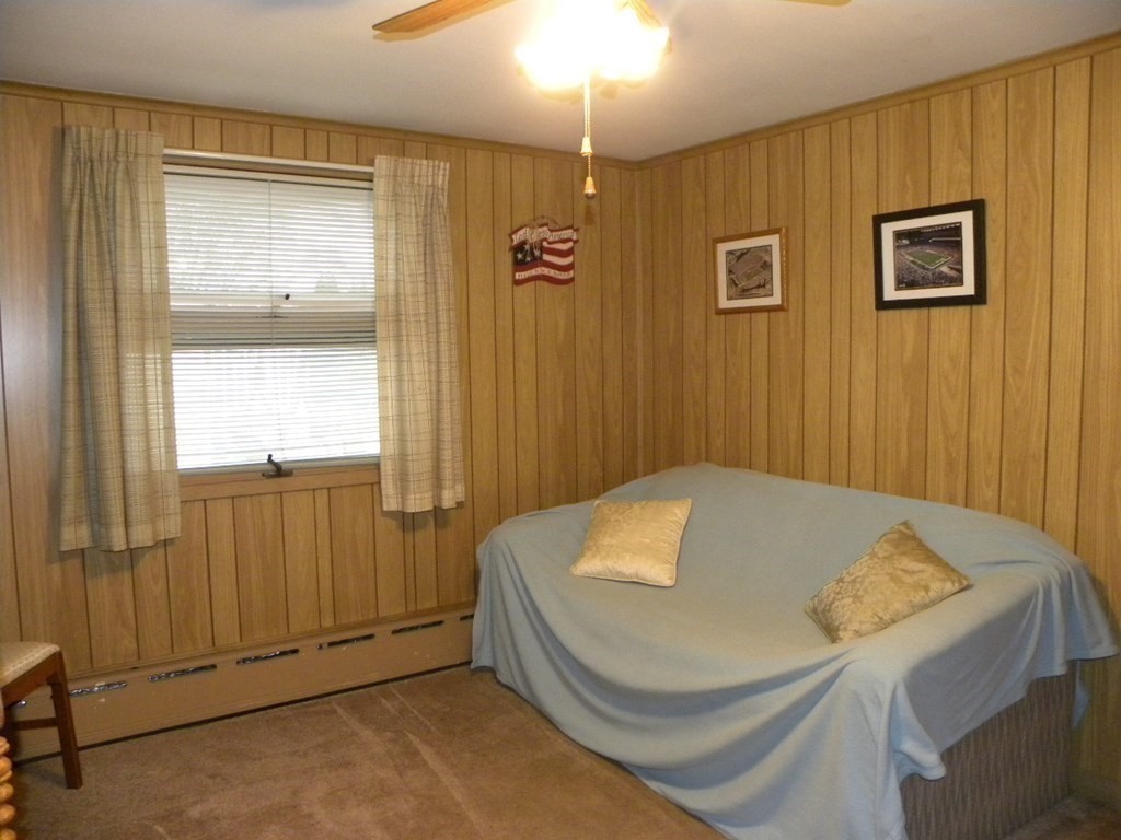 8 Everett Avenue Webster, MA 01570 - Photo 26 of 29 a bathroom with a tub and shower