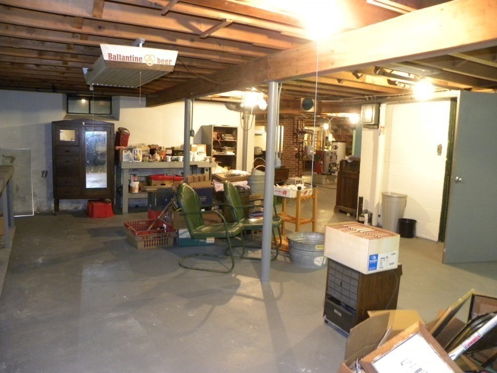 8 Everett Avenue Webster, MA 01570 - Photo 29 of 29 a view of store room with gym equipment
