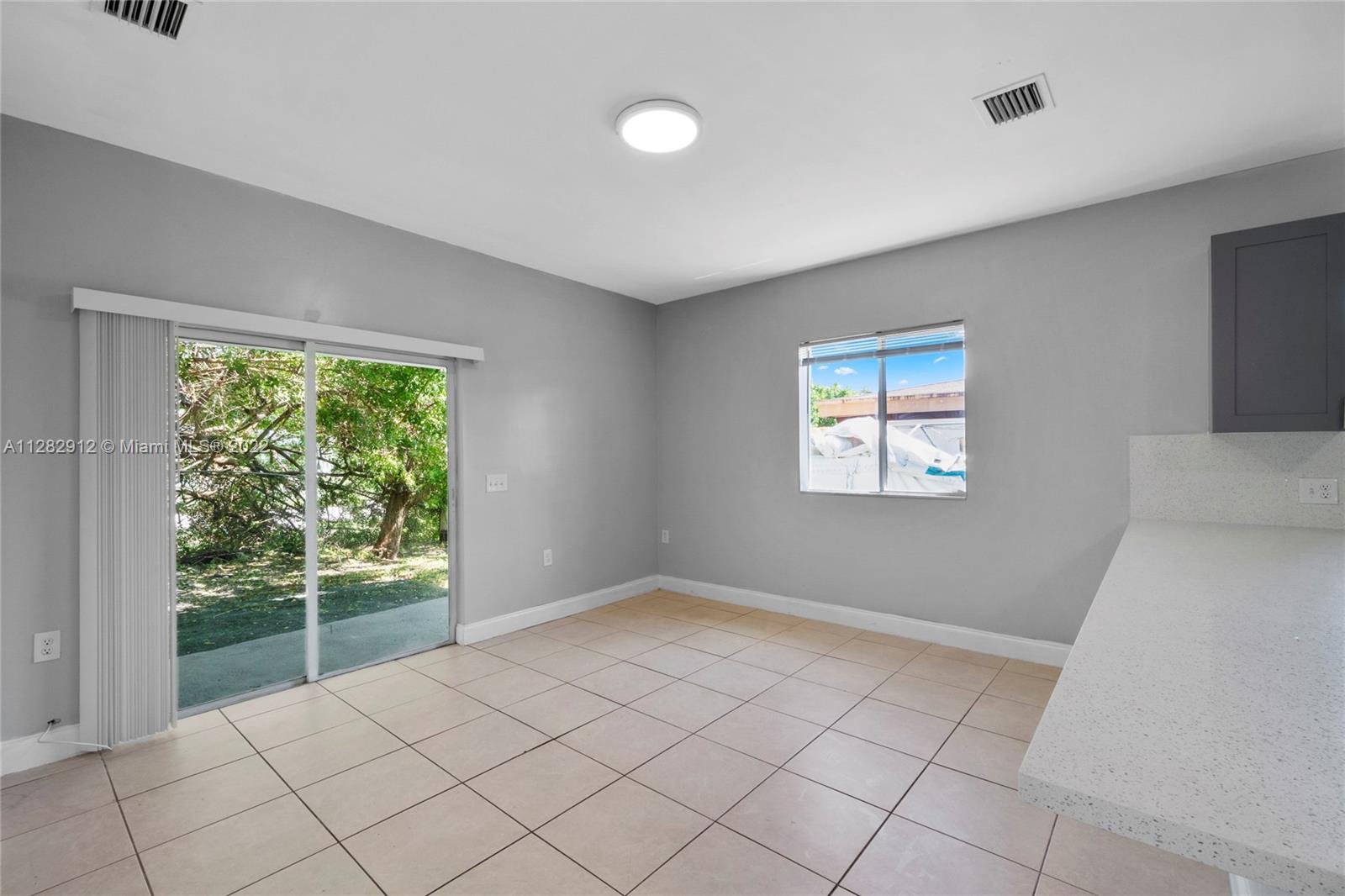 Gladeview Miami, FL 33147 - Photo 13 of 31 a view of an empty room with a window