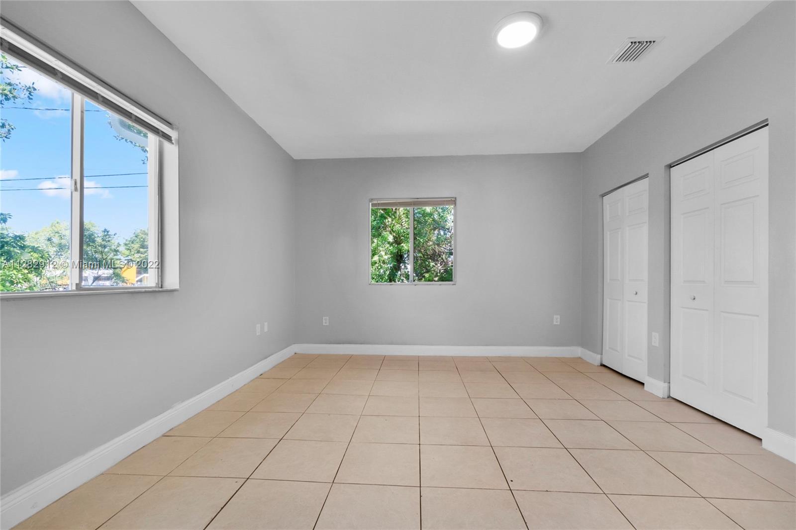 Gladeview Miami, FL 33147 - Photo 17 of 31 an empty room with windows