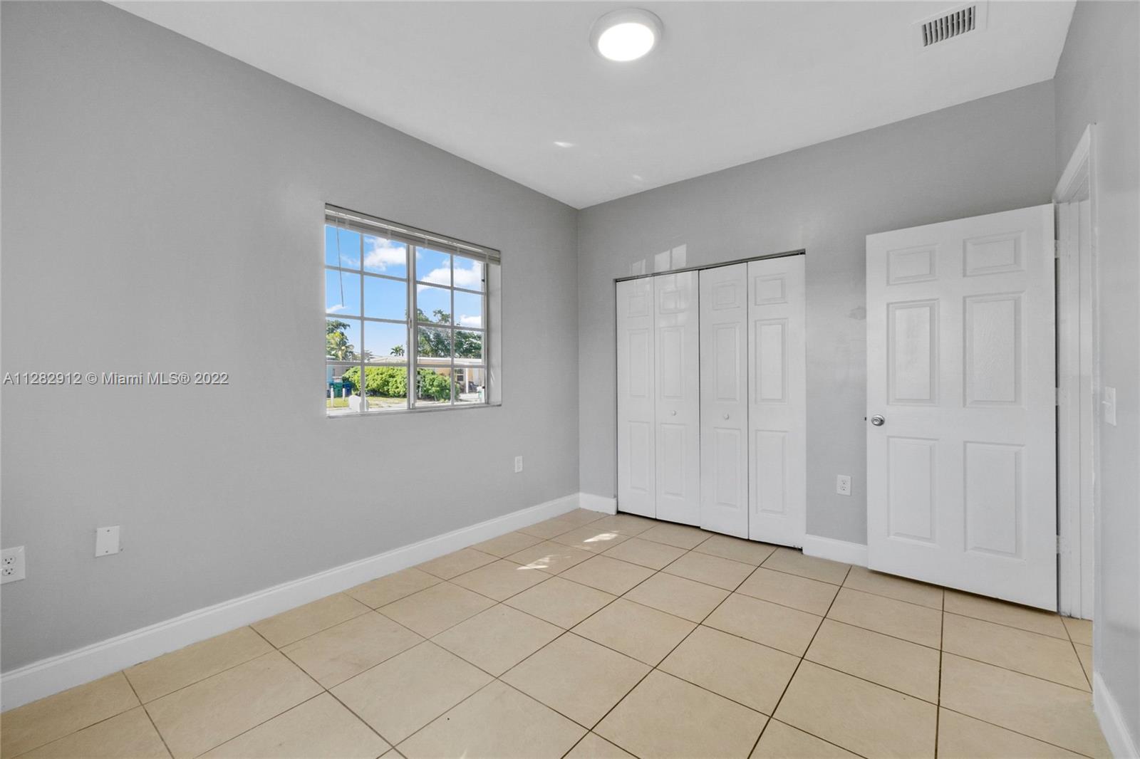 Gladeview Miami, FL 33147 - Photo 21 of 31 a view of an empty room and window