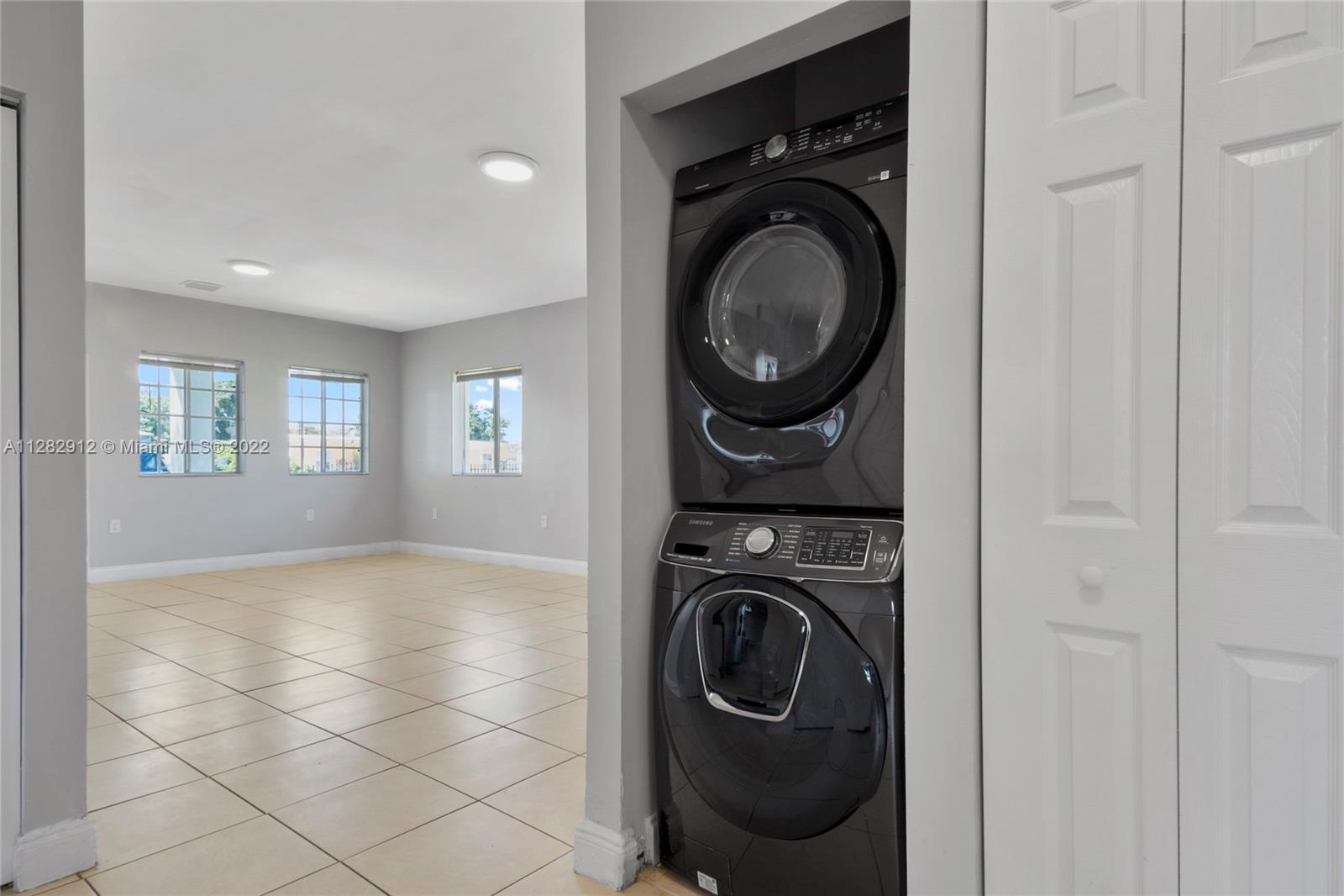 Gladeview Miami, FL 33147 - Photo 28 of 31 a view of a hallway with washer and dryer