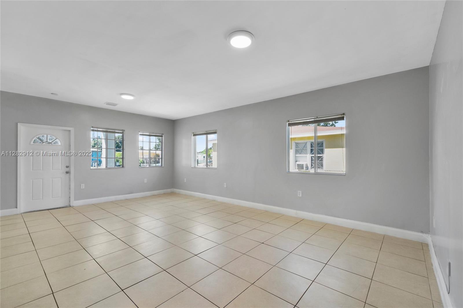 Gladeview Miami, FL 33147 - Photo 6 of 31 an empty room with windows