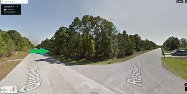 a view of swimming pool with a yard